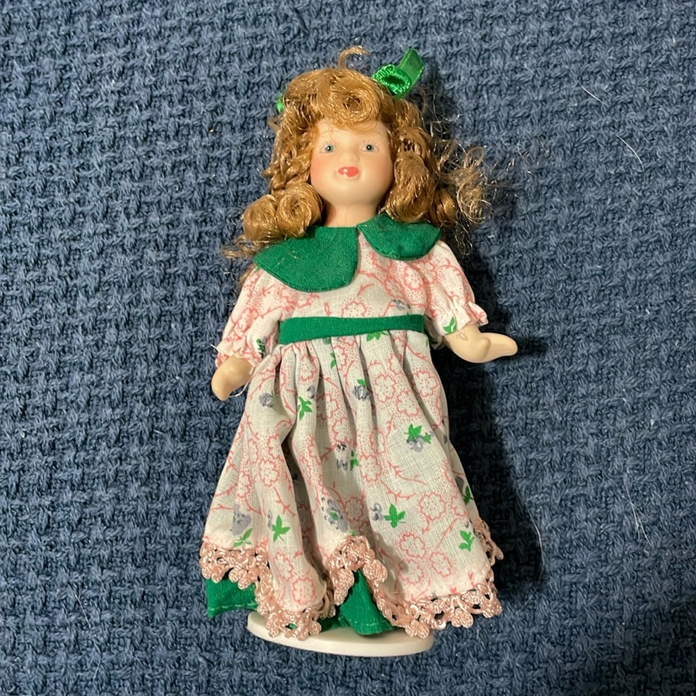 Mini porcelain doll